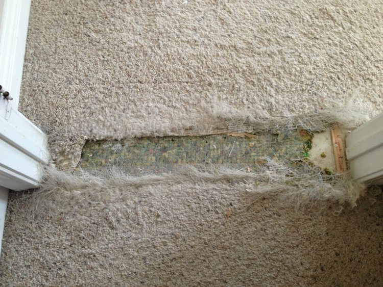 How Can I Fix Carpets That Have Holes?